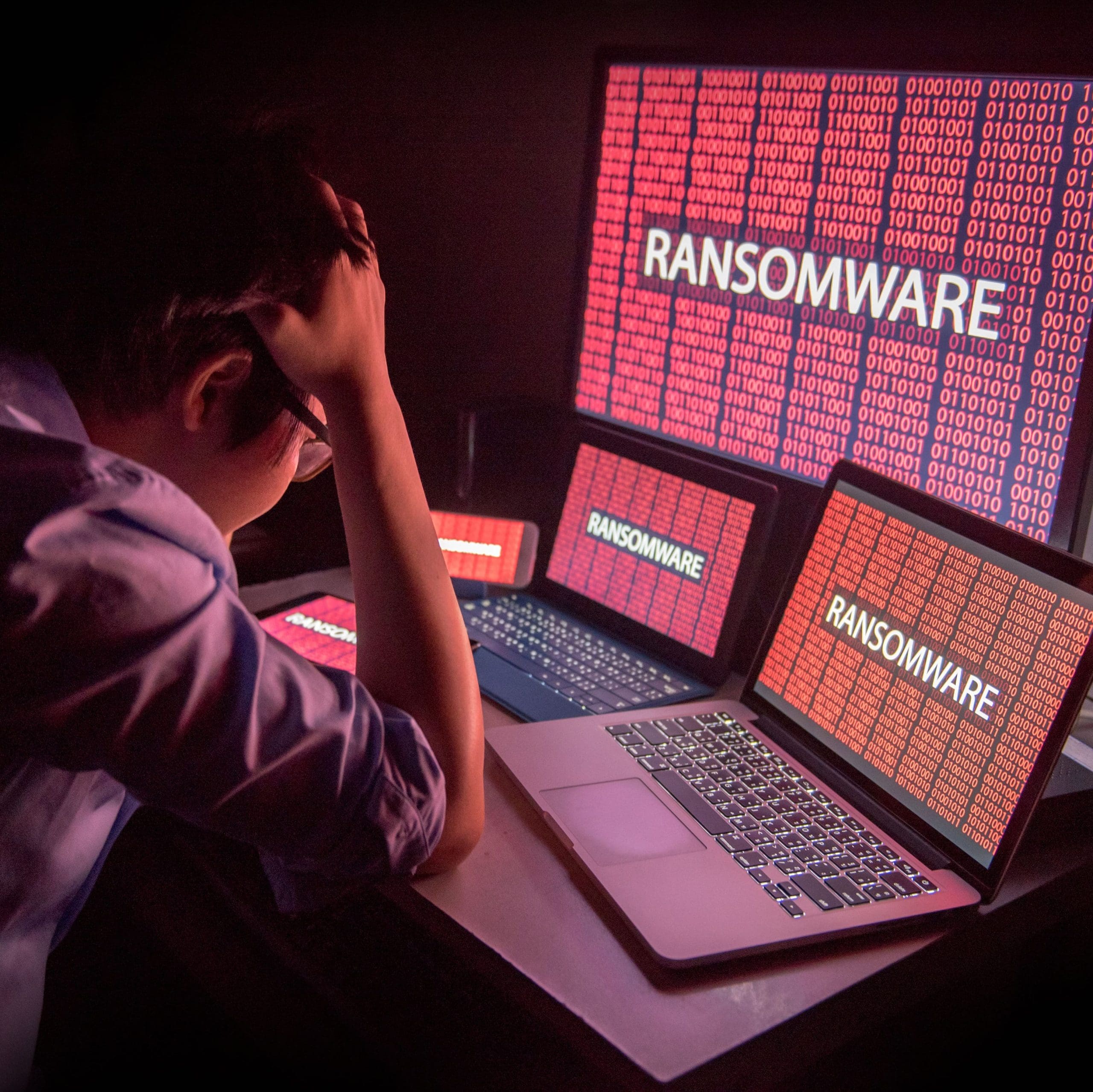 Young male frustrated by ransomware cyber attack