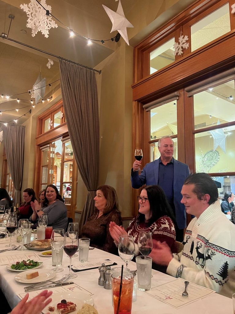 Our CEO giving a toast at our Holiday Dinner.